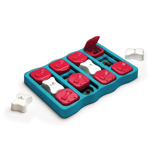 Interactive Nina Ottosson Dog Brick Puzzle for dog food, featuring sliding tiles to hide treats and stimulate mental exercise.